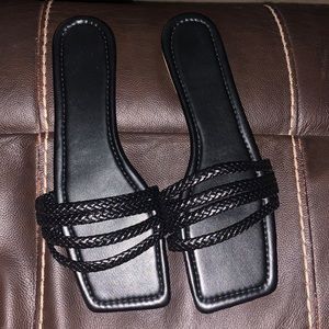 Black braided sandals